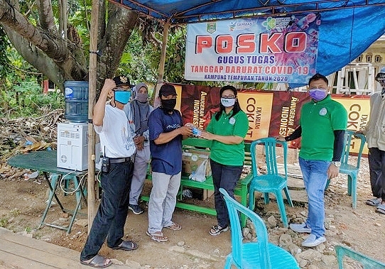 KPML Bagikan Masker dan Disinfektan ke Masyarakat
